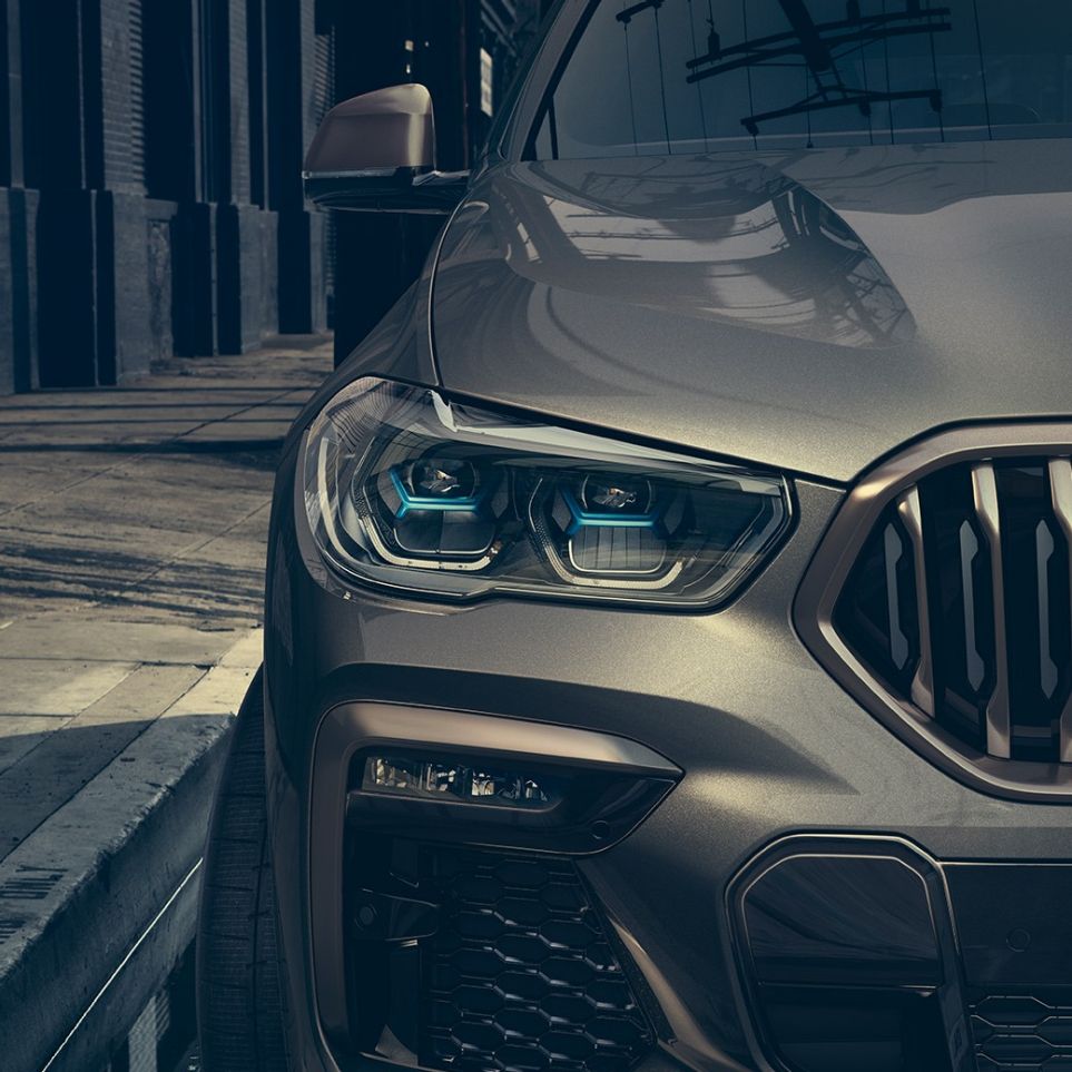 BMW Laserlight. Gros plan de la BMW X6 avec vue sur l’éclairage au laser.