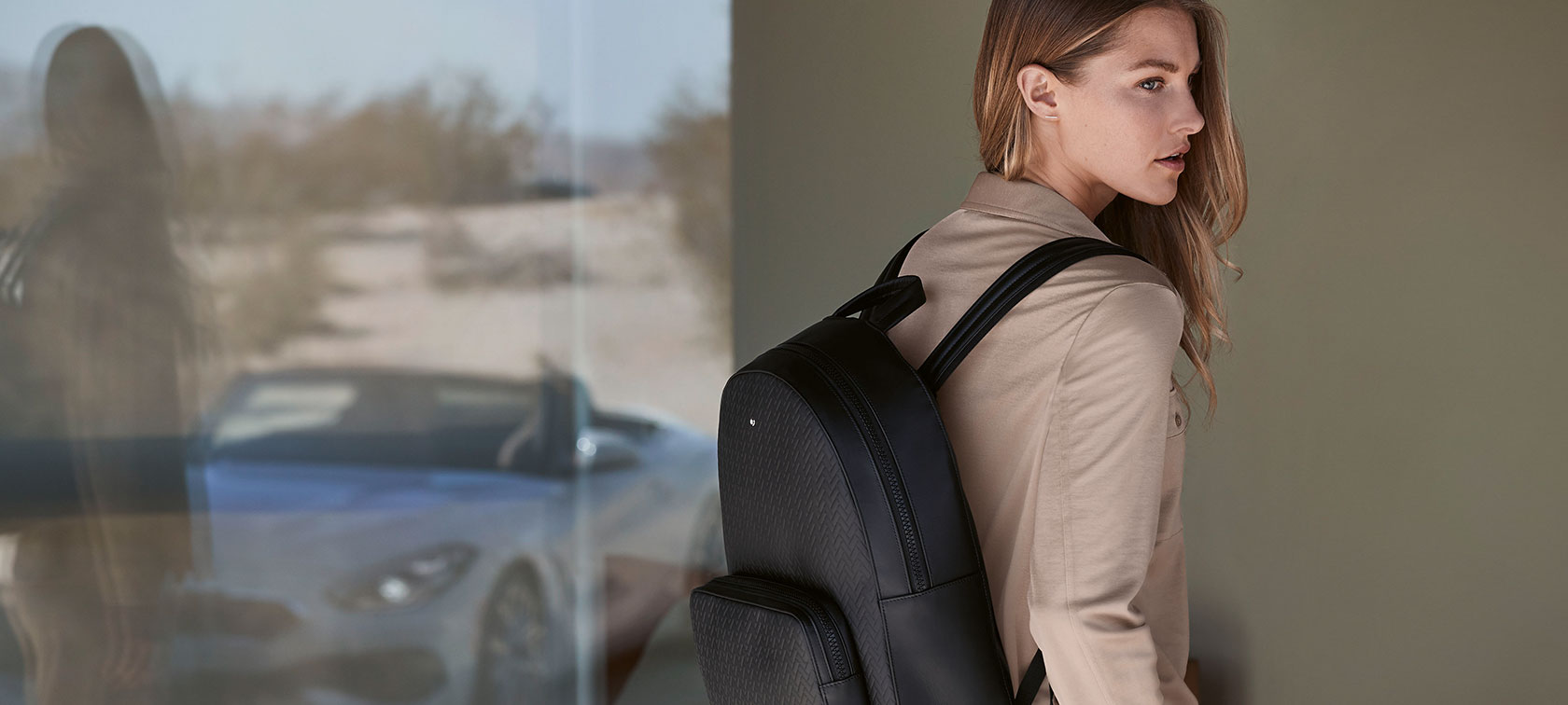 Un modèle féminin porte des pièces de la collection BMW. Un modèle féminin porte des pièces de la collection BMW.